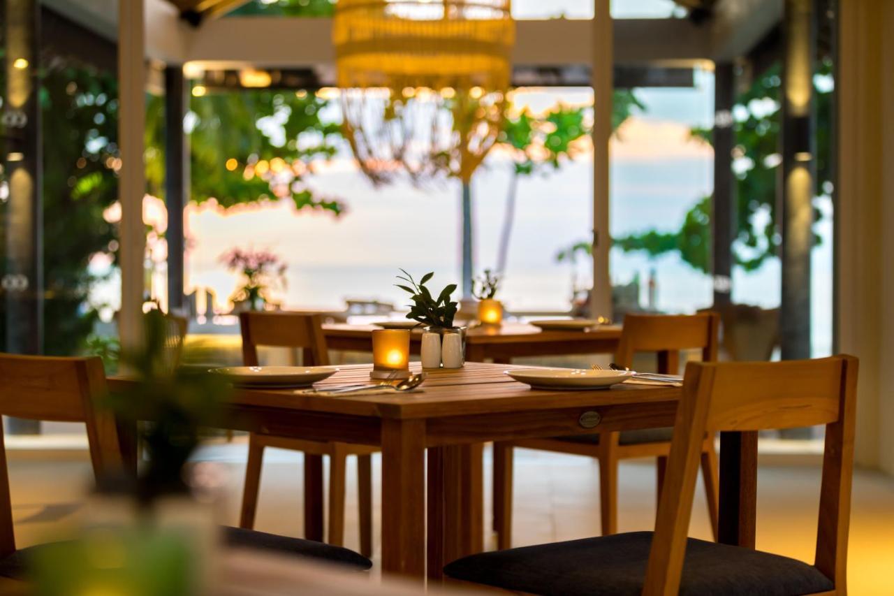 Outrigger Khao Lak Beach Resort - Sha Extra Plus Exterior photo The restaurant at the resort