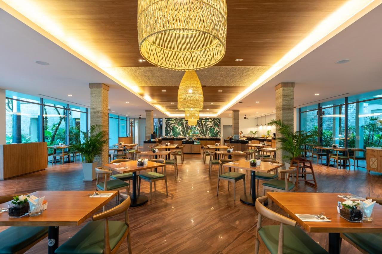 Outrigger Khao Lak Beach Resort - Sha Extra Plus Exterior photo The restaurant at the hotel