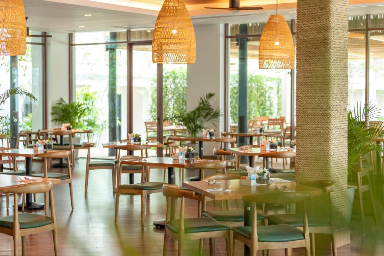 Outrigger Khao Lak Beach Resort - Sha Extra Plus Exterior photo The restaurant
