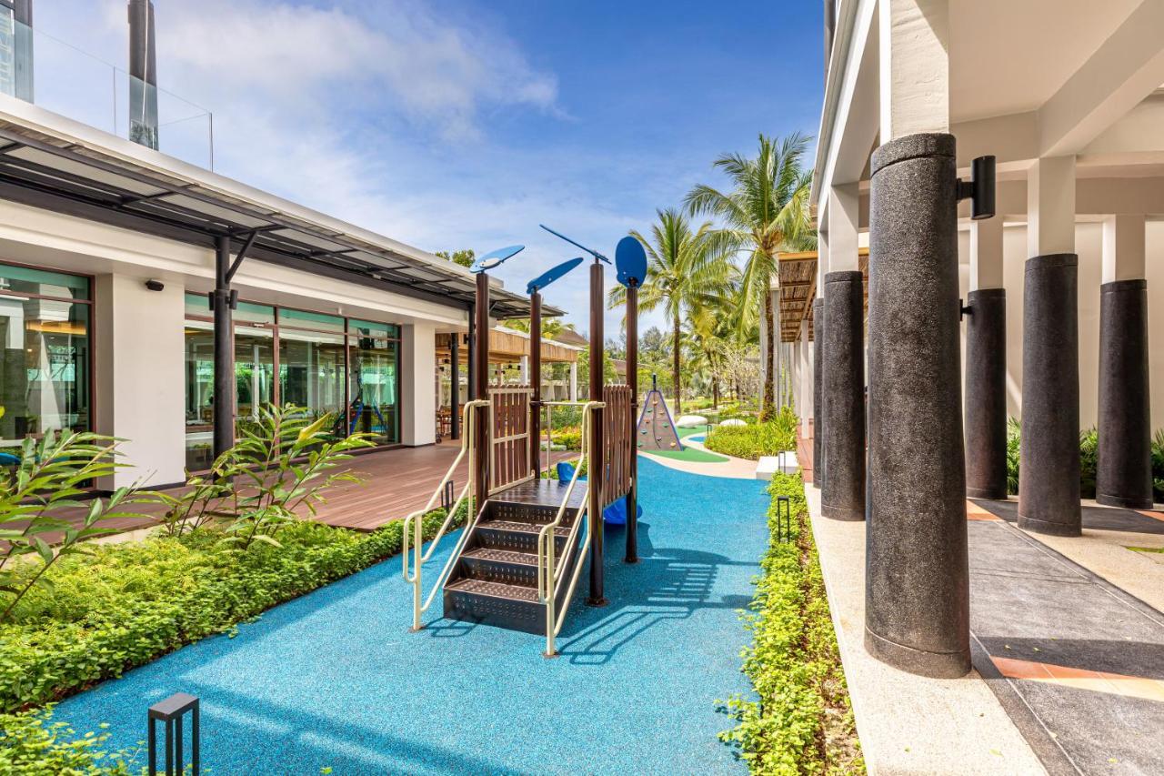 Outrigger Khao Lak Beach Resort - Sha Extra Plus Exterior photo Playground at the school